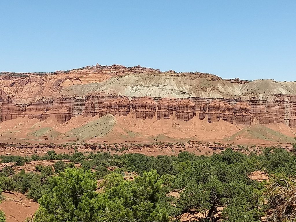 Thousands of years of erosion can be seen along the bases of the Red Rocks. Still, they will rise higher and higher as the geological force presses them upward toward the sky.